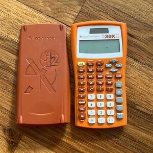 Texas instrument calculator! Orange and working beautifully!